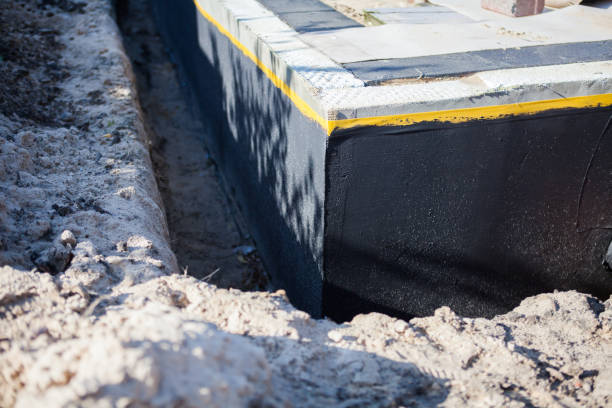 Professional Waterproofing technician working in Independence, MN